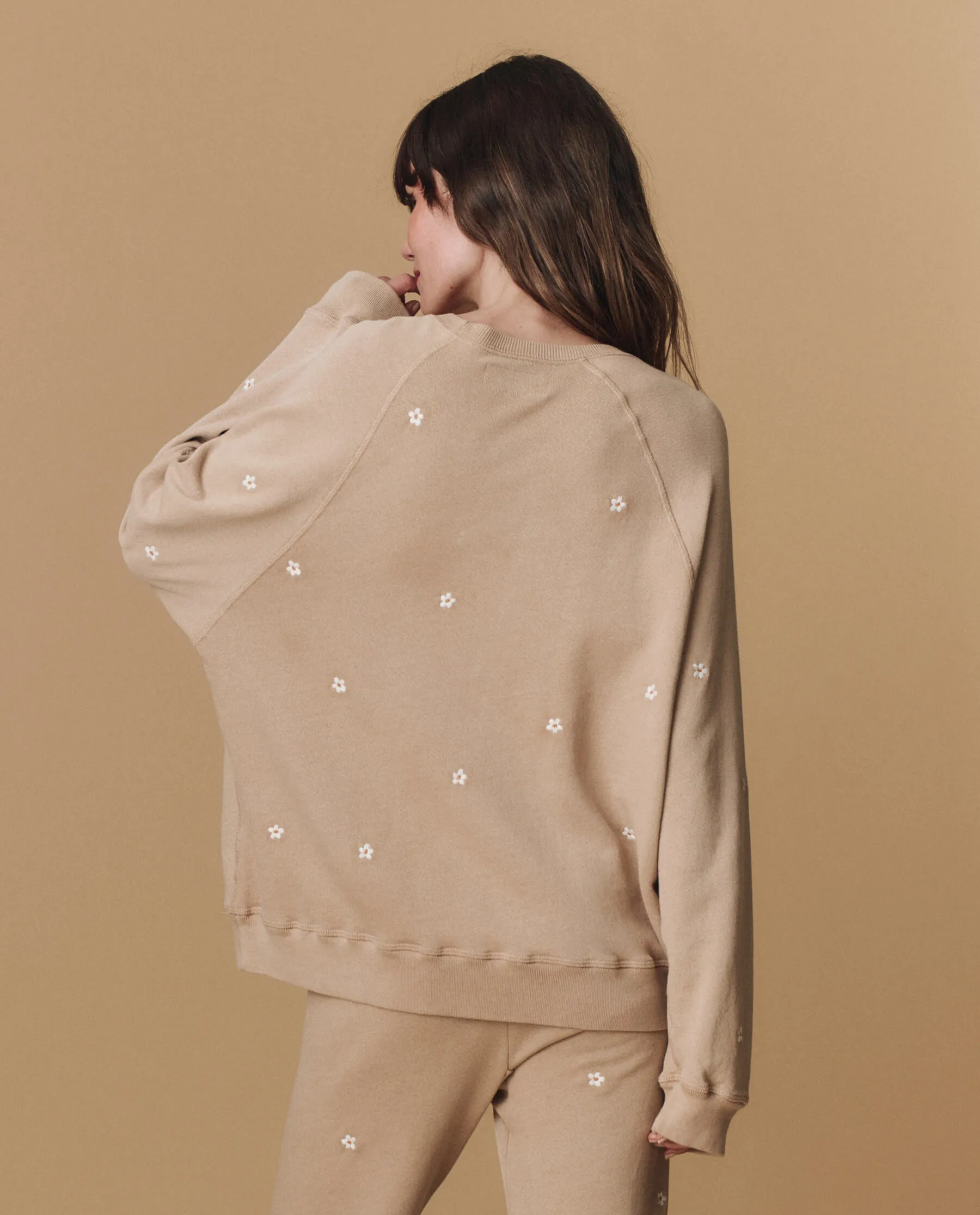 The Slouch Sweatshirt. Embroidered -- Khaki with Daisy Embroidery The Great