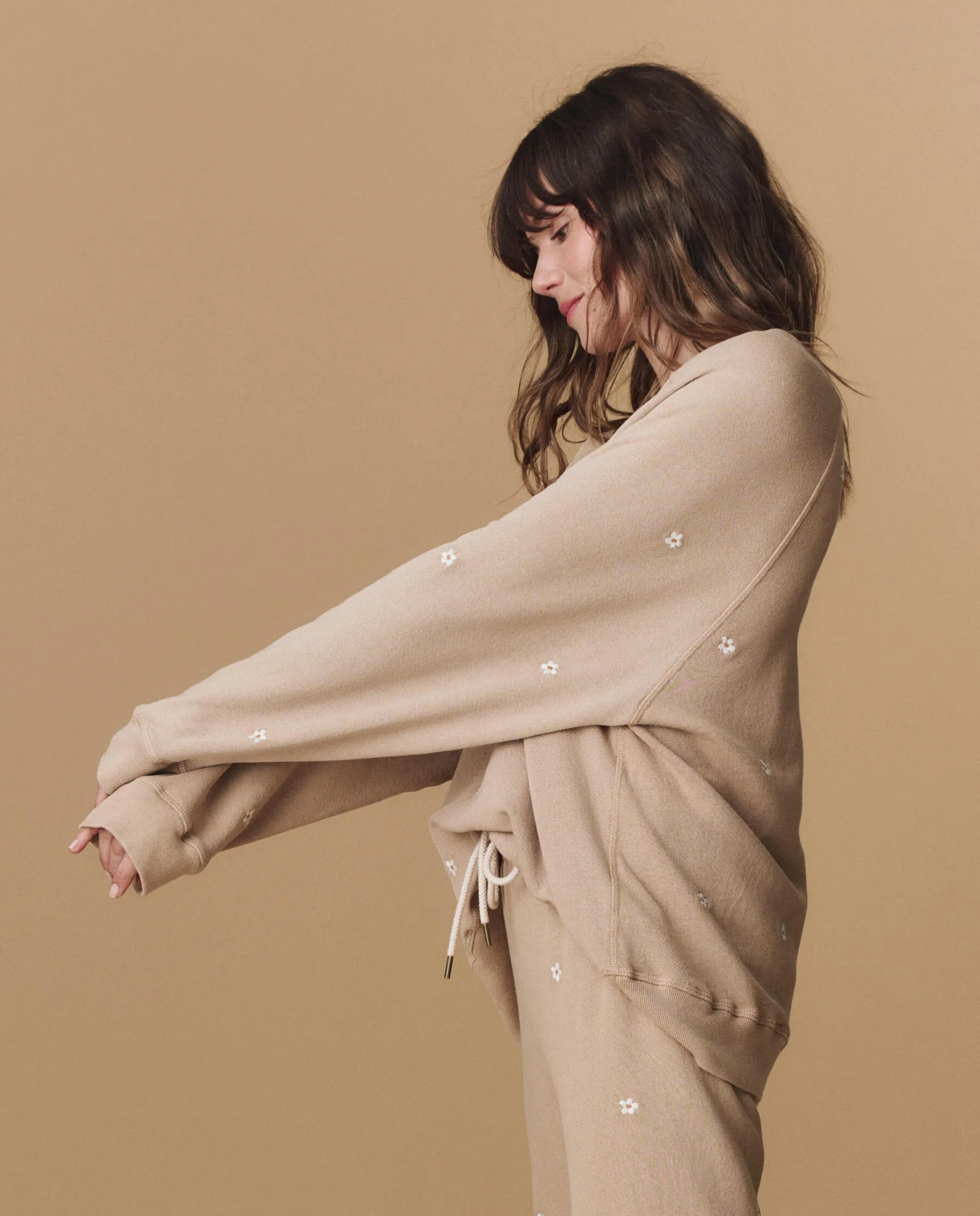 The Slouch Sweatshirt. Embroidered -- Khaki with Daisy Embroidery The Great